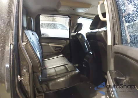 2015 Nissan Titan Pro-4X z USA, uszkodzony, nr VIN 1N6BA0EC7FN504238